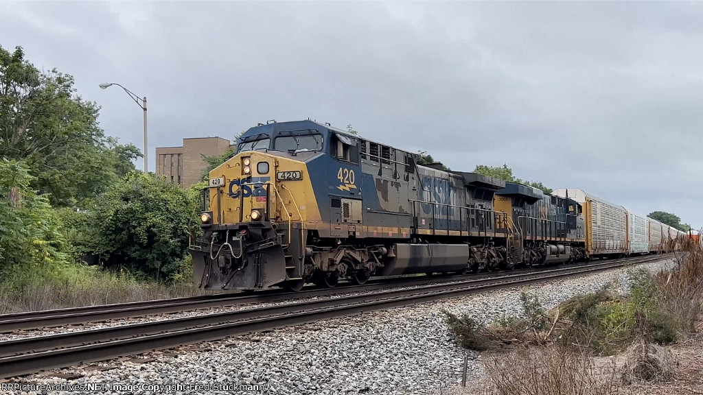 CSX 420 leads M214.